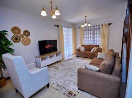 Peaceful and Cozy Home in Arusha, maison de vacances à Ngateu