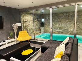 Appartement Standing piscine intérieur privatisée ., hotel a Mutzig