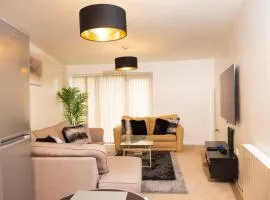 Stylishly Furnished Modern and Spacious 2 bedroom Flat opposite COOP Live n Etihad Stadium Perfect for Short Stays Long Stays and Families with Free Parking n Transport link to Manchester City Centre