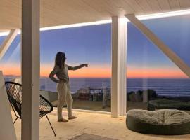 Espectacular Loft, a pasos del mar, hotel with parking in Curanipe