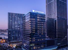 Wyndham Dalian Jinpu, отель в Даляне