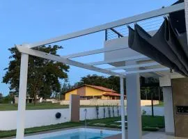 Charmosa casa com piscina - Santa Bárbara Resort