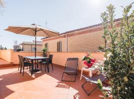 360 GuestHouse - Apartment with terrace，菲烏米奇諾的家庭旅館