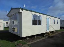 Sealands Everglade II:- 6 Berth, Central Heated Access to the beach