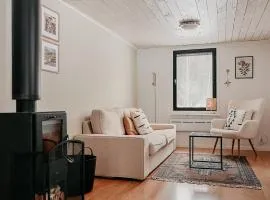 Luxurious red cottage with wood stove near lake