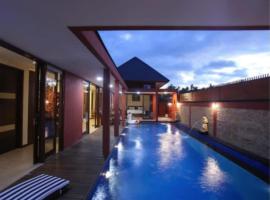 Dawn Golf Villa, cottage in Tanjung