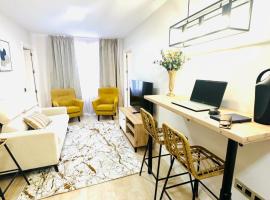 Apartamentos Puente Romano Suites Parking Gratis, place to stay in Merida