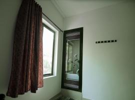 Ammoos Homestay, hotel din Panmana