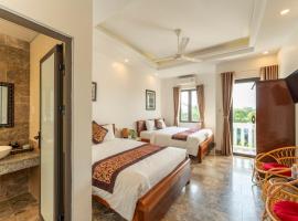 Rice River Villa - Hoi An, hotel en Hoi An