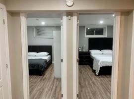 A bedroom in a basement, Hotel in Guelph