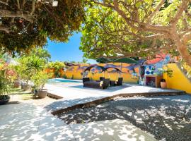 Maison d'invités dans jardin tropical avec piscine à Tahiti, hotel in Atiue