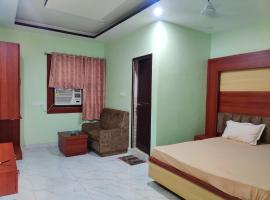 OYO Hotel Anandam Residency, хотел в Данбад
