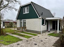 Huisje aan de kust, maison de vacances à Sint Maartensvlotbrug