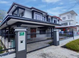 Tar2 @One Homestay, 4 Bedrooms, hotel in Sibu