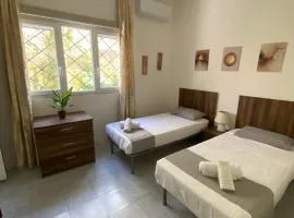 Spacious room with 2 single beds shared bathroom, st Julians