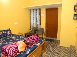 Pleasantstay rooms and cottages, quarto em acomodação popular em Yercaud