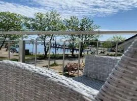Ferienhaus Am Hafen 12 Altwarp mit Sauna, Kamin und Wasserblick