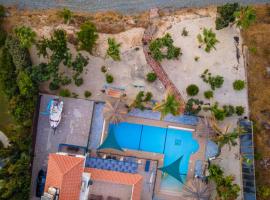 Astrofegia Beachfront Villa, viešbutis mieste Pomosas