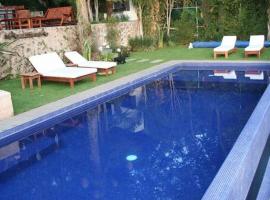 Casa Manguito :Hermosa, vista a lago, excelente ubicación y clima, ваканционна къща в Вале де Браво