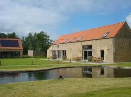 Ferienhaus mit gemeinsamem Pool und Garten