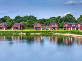 Holiday homes by the lake in the Geesthof holiday park Hechthausen, hotel cu parcare din Hechthausen
