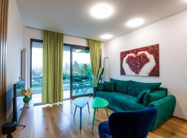 City Center - Sunrise Apartment with Parking