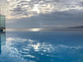 Seafront Aegeans blue pearl over infinity pool, hotel in Keratea