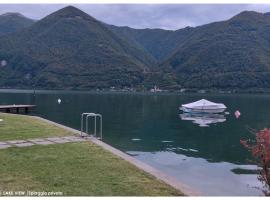 LF_SUITE_ Lugano Lake_ Ampia Terrazza ; Spiaggia privata_ WI-FI_ Netflix_, hôtel à Porlezza