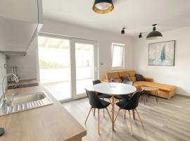 Apartments Puntica 2+1 person Rab, beach hotel in Rab