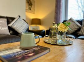 Cosy Apartment Glasgow Airport, hotel i Paisley