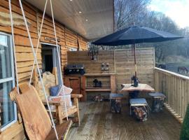 Devon River Glamping Pods, hotel amb aparcament a Alloa