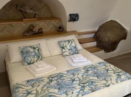 Stanza privata con giardino, guest house in La Maddalena
