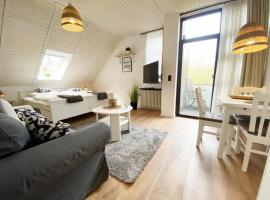 Haus Wiesenweg - Apartment 2, Hotel in Horumersiel