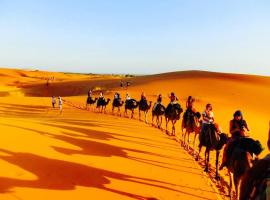 Enjoy Moda Camp Merzouga tours- Camel sunset sunrise Quad Sunboarding ATV, מלון במרזוגה