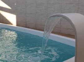 Casa ampla e agradável com piscina e churrasqueira