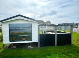 Chalet direct aan Waddenzee, camping en Westerland