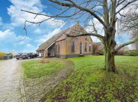 Comfortable farmhouse with terrace, hotel with parking in Nijeveen