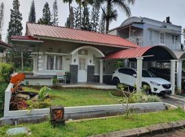 Villa Panda H2 Kota Bunga Puncak, cabaña o casa de campo en Cikundul