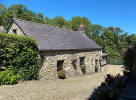 Old Stable Cottage Nanternis, rumah liburan di Llanllwchaiarn