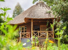 Rutete Eco Lodge, готель біля визначного місця Rangers House, у місті Rwinkwavu