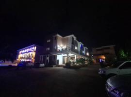 Mountain Inn Hotel, hotell i Mbale