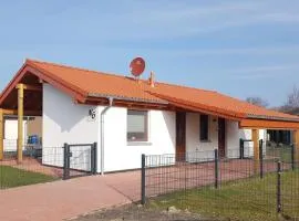N6 freistehendes eingezäuntes Ferienhaus in Eckwarderhörne mit Terrasse und Garten, Wlan, Nordsee