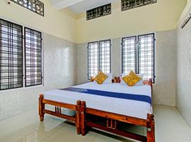 SPOT ON J P Tourist Home, hotel a Kollam