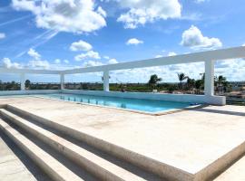 CARAIBICO SUITES Rooftop Pool & Beach Club, viešbutis Punta Kanoje