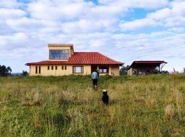 Hospedaje en casa de campo Boyacá con anfitriones locales โรงแรมในToca