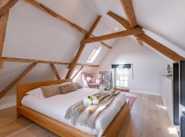 Charming room in the green neighbourhood of Gent, hotel con parking en Gante