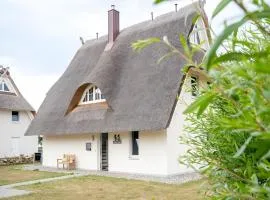 Wiesenpieper - Ferienhaus mit Kamin, Sauna und Meerblick