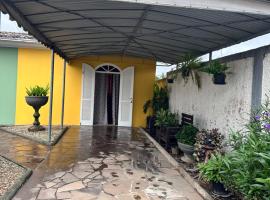 La vita hospedaria (quarto amarelo), sted med privat overnatting i Nova Veneza