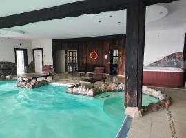 Domek u Rybaka na Mazurach z basenem, hotel v destinaci Guzowy Piec