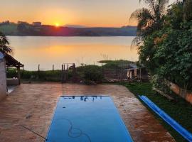 Casa Alfenas Represa Furnas c/ Piscina Aquecida 12 pessoas, hotel ramah hewan peliharaan di Alfenas